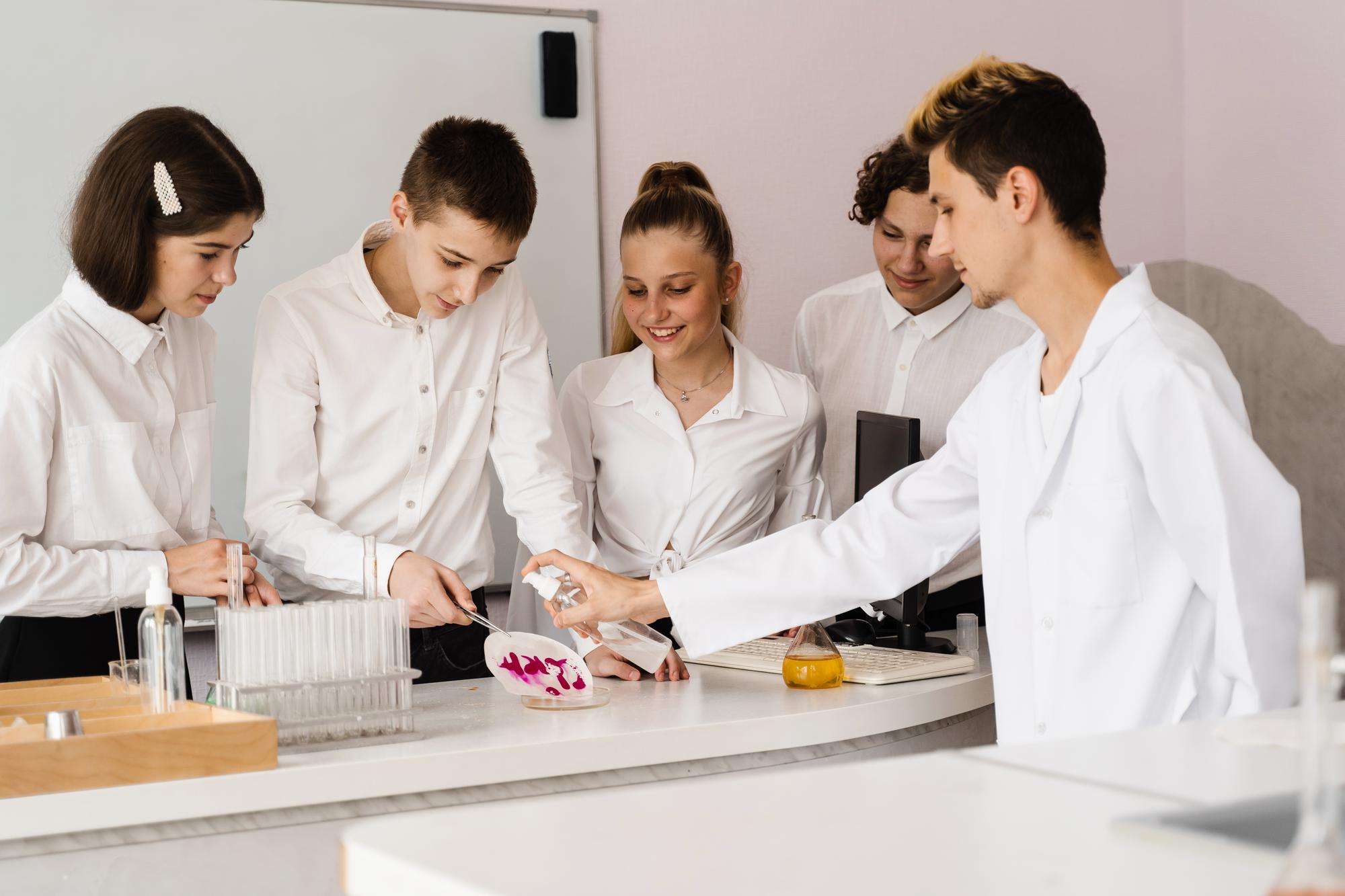 Small team in a bright experimental kitchen